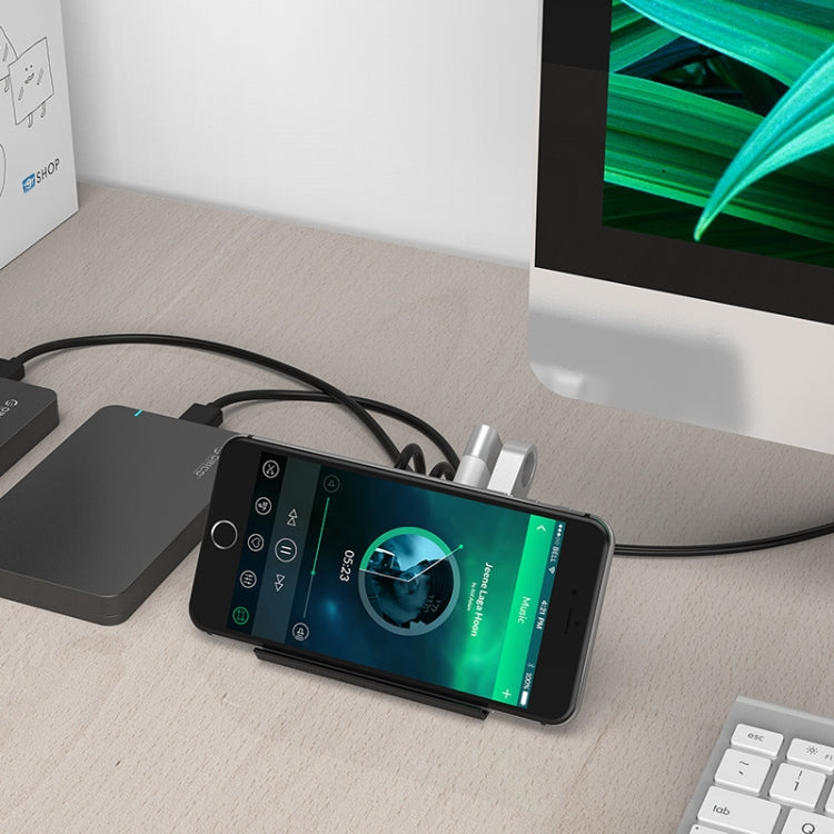 ORICO SHC-U3 วัสดุ ABS เดสก์ท็อป 4 พอร์ต USB 3.0 HUB พร้อมที่วางโทรศัพท์ / แท็บเล็ตและสาย USB 1 ม. และไฟ LED, SHC-U3