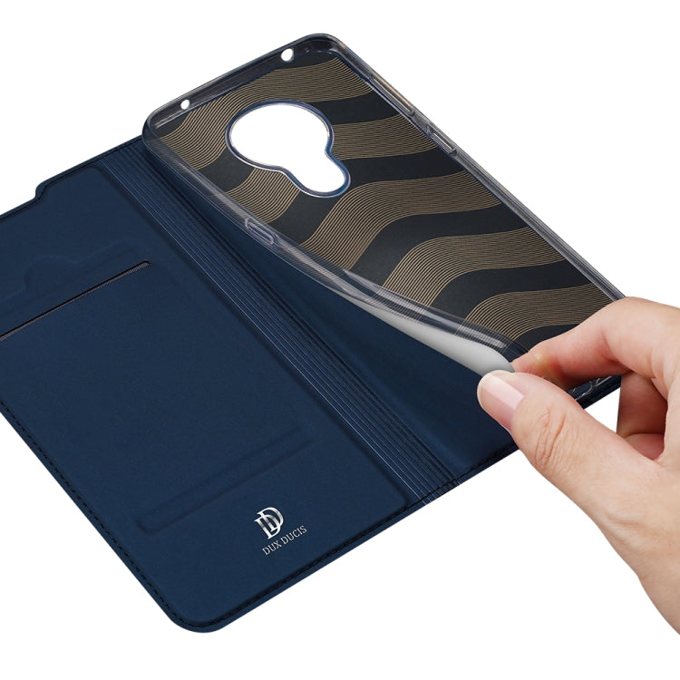 DUX DUCIS Skin Pro Series ซองหนัง PU + TPU แบบพลิกแนวนอนพร้อมตัวยึดและช่องเสียบการ์ด, For Nokia 5.3