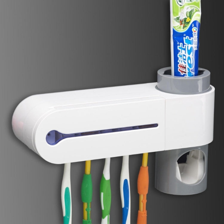 เครื่องจ่ายยาสีฟันอัตโนมัติทันตกรรม UV อัลตราไวโอเลตแปรงสีฟันที่นึ่งขวดนมผู้ถือ