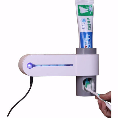 เครื่องจ่ายยาสีฟันอัตโนมัติทันตกรรม UV อัลตราไวโอเลตแปรงสีฟันที่นึ่งขวดนมผู้ถือ