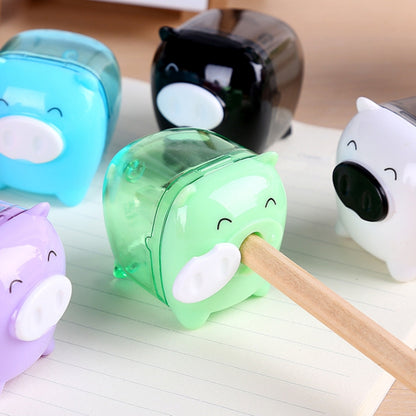 เครื่องเหลาดินสอแบบแมนนวล Deli Mini Pig เหมาะสำหรับเด็กที่โรงเรียนโฮมออฟฟิศ การจัดส่งสีแบบสุ่ม, 0557
