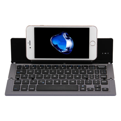 F18 คีย์บอร์ดไร้สาย Bluetooth พับได้แบบชาร์จได้บางเฉียบ 58 คีย์พร้อมตัวยึด