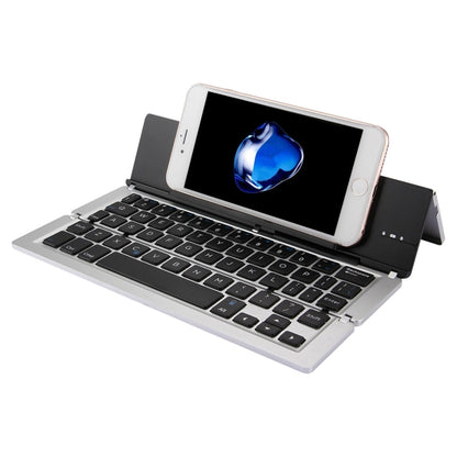 F18 คีย์บอร์ดไร้สาย Bluetooth พับได้แบบชาร์จได้บางเฉียบ 58 คีย์พร้อมตัวยึด