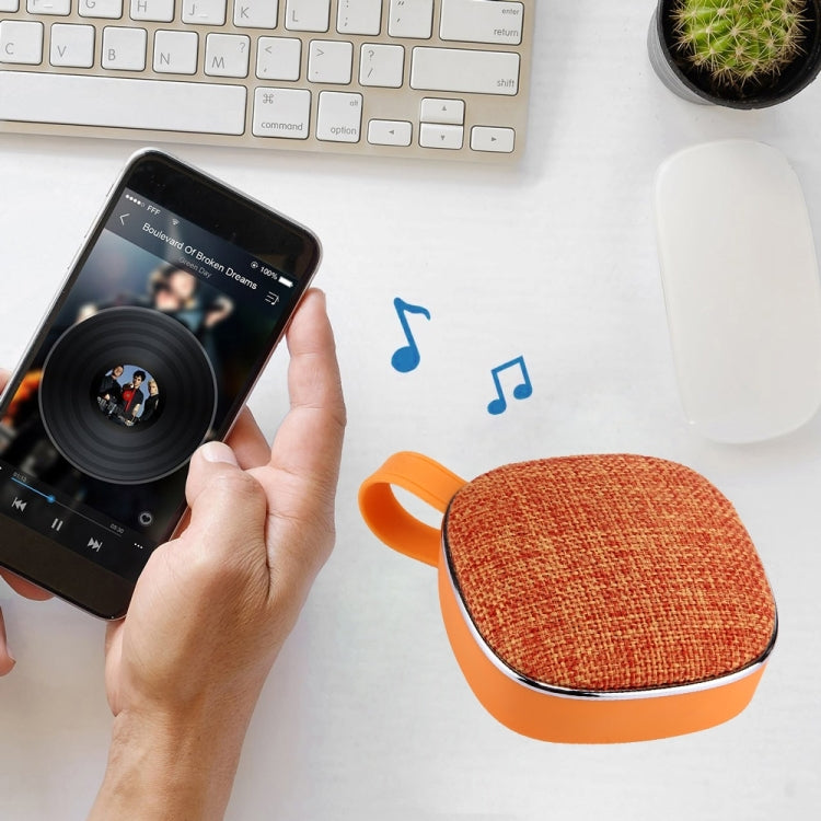 X25 การออกแบบผ้าแบบพกพาลำโพงสเตอริโอ Bluetooth พร้อมไมโครโฟนในตัวรองรับการโทรแบบแฮนด์ฟรีและการ์ด TF และ AUX IN ระยะทาง Bluetooth: 10 ม.