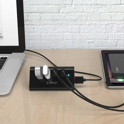 ORICO SHC-U3 วัสดุ ABS เดสก์ท็อป 4 พอร์ต USB 3.0 HUB พร้อมที่วางโทรศัพท์ / แท็บเล็ตและสาย USB 1 ม. และไฟ LED, SHC-U3