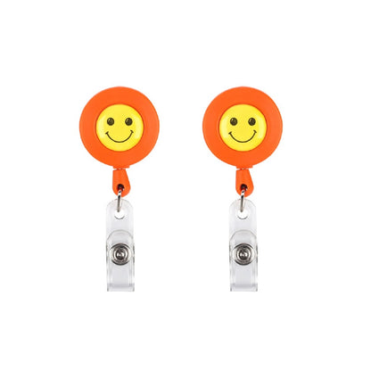 2 ชิ้น ID ง่ายต่อการดึงหัวเข็มขัดผู้ถือใบหน้ายิ้มแท็กชื่อบัตรที่สำคัญตราผู้ถือพับเก็บได้