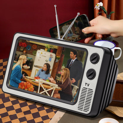 Retro TV โทรศัพท์มือถือหน้าจอเครื่องขยายสัญญาณวิดีโอที่วางโทรศัพท์มือถือ