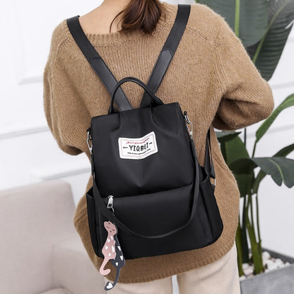 กระเป๋าสะพายหลังป้องกันการโจรกรรมมัลติฟังก์ชั่น Crossbody Casual Tote Bag พร้อมจี้ประดับ, 624